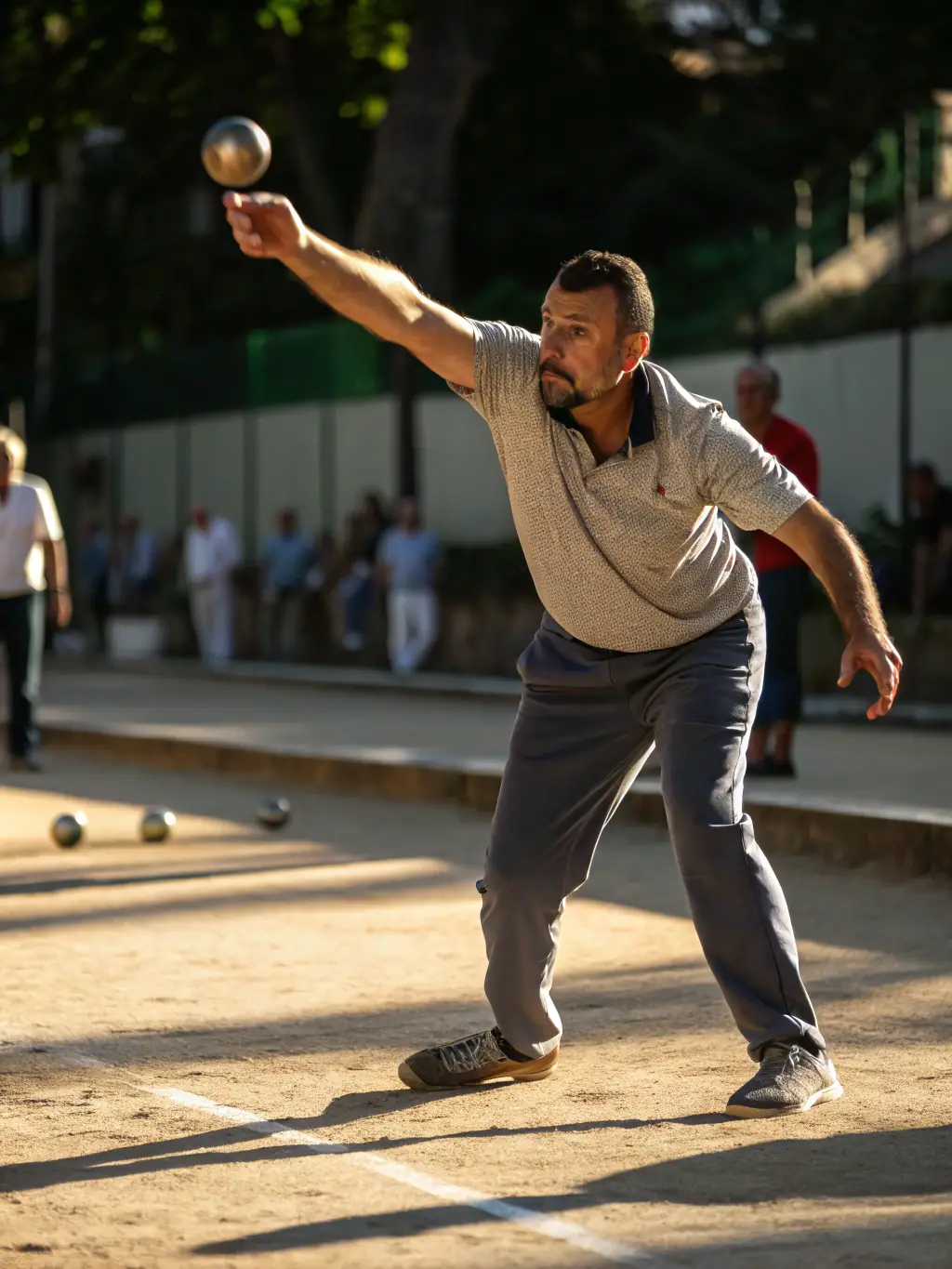 A close-up image of boules being skillfully thrown during a training session at LE CARREAU MURATAIS, emphasizing the precision and technique required in the sport.